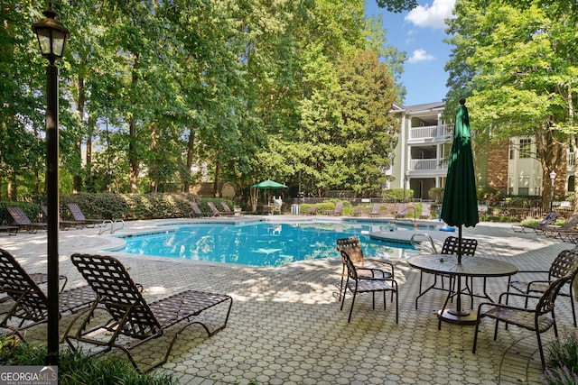 112 Bentley Pl, Tucker, GA 30084 - community pool featuring a patio and fence