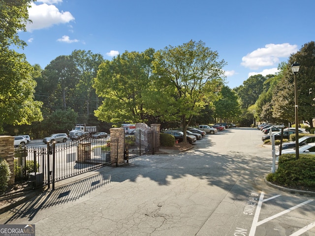 112 Bentley Pl, Tucker, GA 30084 - view of road featuring street lights and a gate