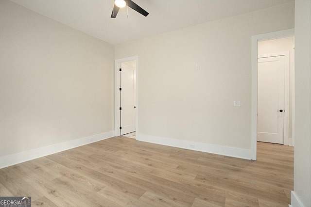 502 Camp Lake Rd, Monroe, GA 30655 - spare room with ceiling fan, light wood finished floors, and baseboards