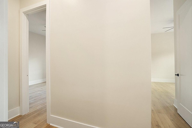502 Camp Lake Rd, Monroe, GA 30655 - hallway with light wood-style flooring and baseboards