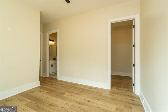 502 Camp Lake Rd, Monroe, GA 30655 - spare room featuring light wood-style flooring and baseboards
