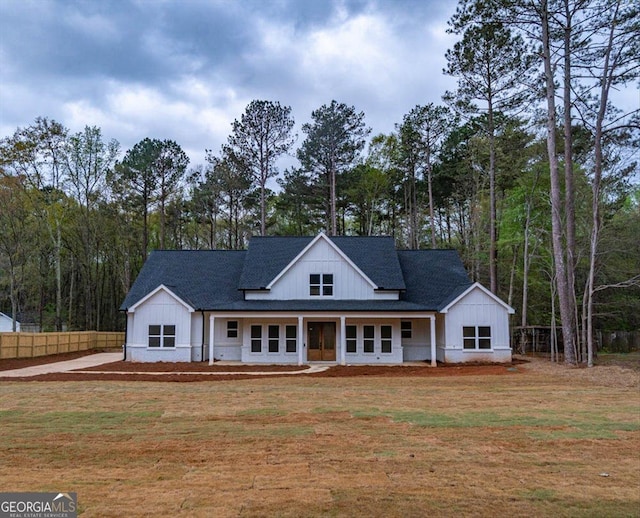 502 Camp Lake Rd, Monroe, GA 30655 - modern farmhouse featuring a shingled roof