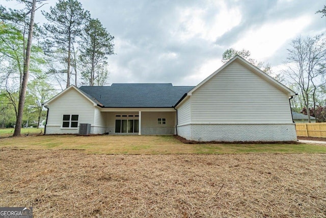 502 Camp Lake Rd, Monroe, GA 30655 - back of house featuring central AC, brick siding, and a shingled roof