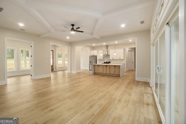 502 Camp Lake Rd, Monroe, GA 30655 - unfurnished living room with recessed lighting, a ceiling fan, baseboards, light wood-style flooring, and beam ceiling