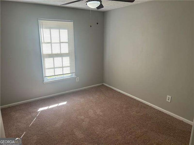 2039 Corners Cir, Lithonia, GA 30058 - carpeted spare room with ceiling fan and baseboards