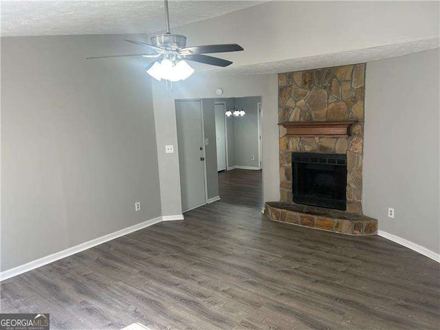 2039 Corners Cir, Lithonia, GA 30058 - unfurnished living room with ceiling fan, wood finished floors, a textured ceiling, and a fireplace