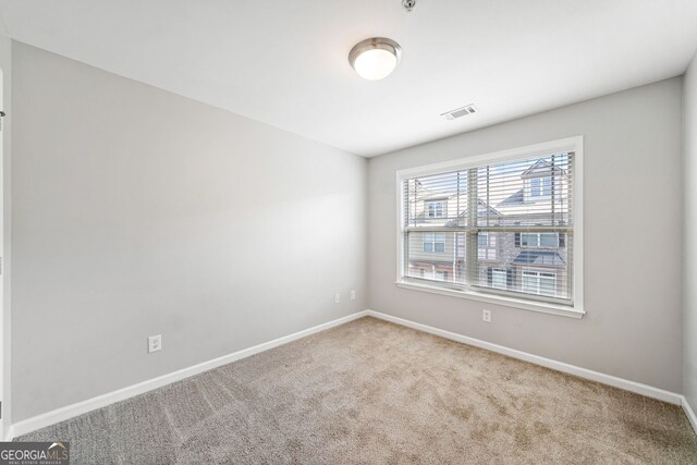 540 Ridge View Xing, Woodstock, GA 30188 - carpeted spare room featuring baseboards and fire sprinkler in ceiling
