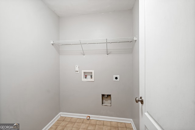 540 Ridge View Xing, Woodstock, GA 30188 - washroom featuring washer hookup, hookup for a gas dryer, hookup for an electric dryer, light tile patterned floors, and baseboards