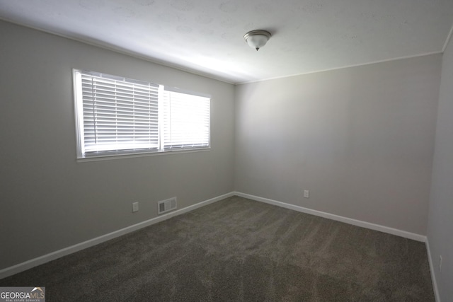 619 Church St NW, Atlanta, GA 30318 - spare room featuring baseboards, visible vents, and carpet flooring