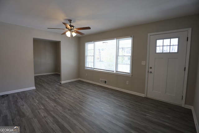 619 Church St NW, Atlanta, GA 30318 - foyer entrance with baseboards, ceiling fan, visible vents, and dark wood finished floors