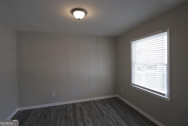 619 Church St NW, Atlanta, GA 30318 - empty room with baseboards and dark wood finished floors