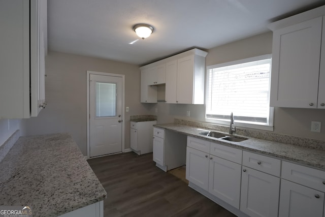 619 Church St NW, Atlanta, GA 30318 - kitchen featuring white cabinets, a sink, light stone countertops, and wood finished floors