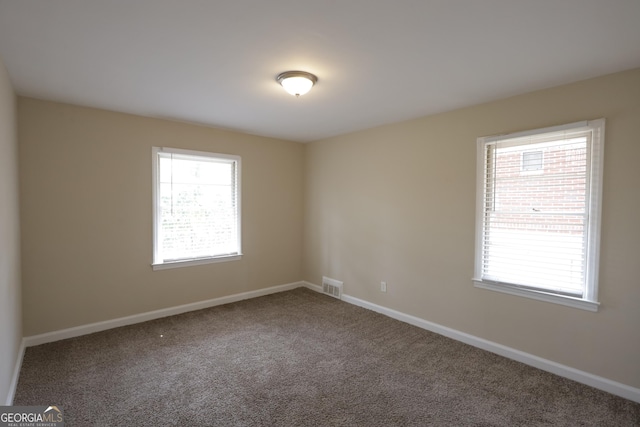 1923 Rosewood Rd, Decatur, GA 30032 - spare room with baseboards, a wealth of natural light, visible vents, and carpet