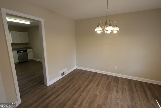 1923 Rosewood Rd, Decatur, GA 30032 - unfurnished dining area with baseboards, visible vents, dark wood-type flooring, and a notable chandelier