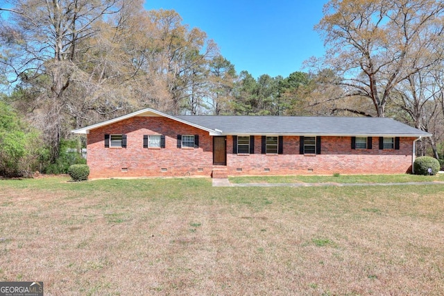 ranch-style home featuring brick siding, a front lawn, and crawl space