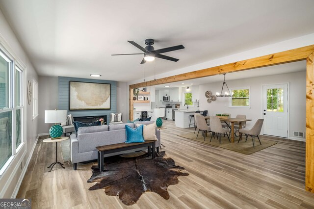 3069 Thrasher Cir, Decatur, GA 30032 - living room featuring light wood-style flooring, ceiling fan, a chandelier, and recessed lighting