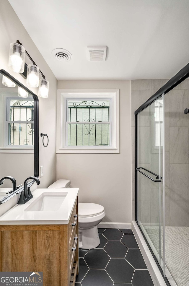 3069 Thrasher Cir, Decatur, GA 30032 - full bathroom with vanity, a stall shower, and tile patterned floors
