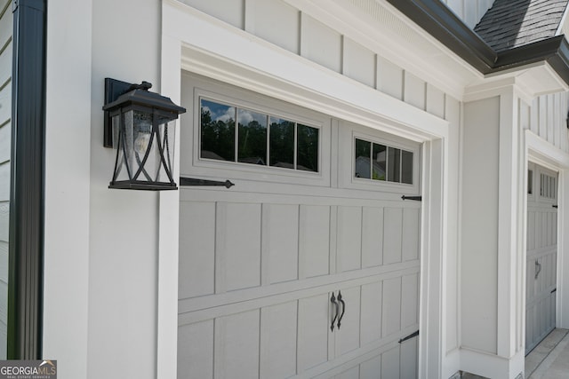 exterior details featuring a shingled roof