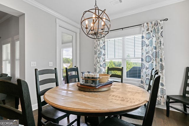 dining area featuring a chandelier, baseboards, visible vents, ornamental molding, and dark wood-style flooring