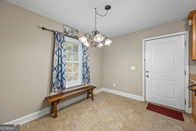 104 Nugget Ln, Ellijay, GA 30540 - foyer entrance featuring a chandelier and baseboards