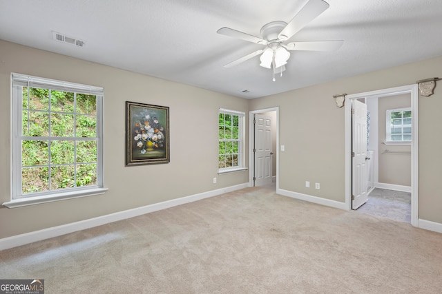 104 Nugget Ln, Ellijay, GA 30540 - unfurnished bedroom with baseboards, carpet flooring, a ceiling fan, and a spacious closet