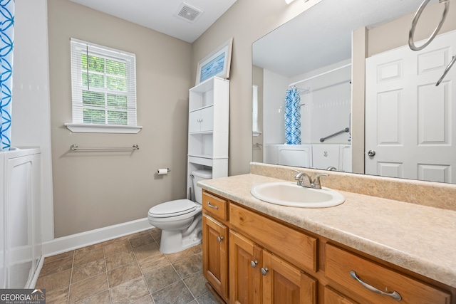 104 Nugget Ln, Ellijay, GA 30540 - full bathroom featuring baseboards, toilet, vanity, curtained shower, and stone finish floors