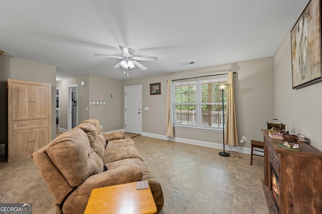104 Nugget Ln, Ellijay, GA 30540 - living room with a ceiling fan and baseboards