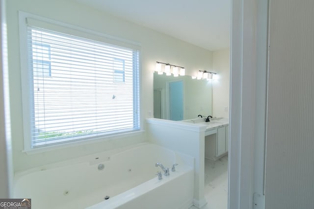 full bath with a jetted tub and vanity