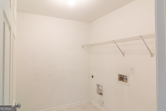 laundry room featuring electric dryer hookup, laundry area, marble finish floor, baseboards, and hookup for a washing machine
