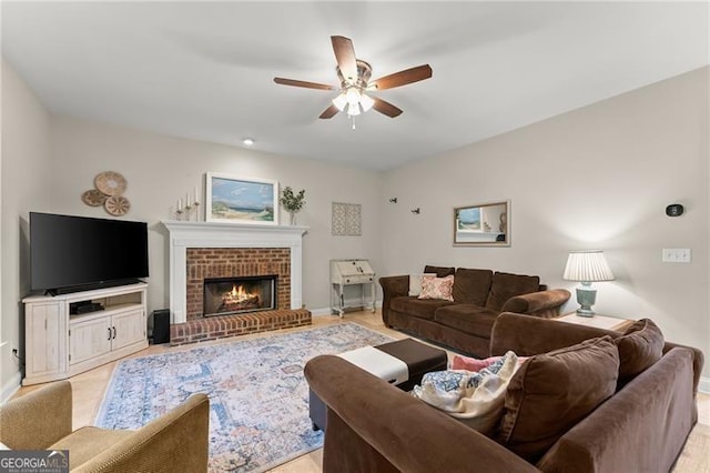 5055 Hamptons Club Dr, Alpharetta, GA 30004 - living area with a ceiling fan and a brick fireplace