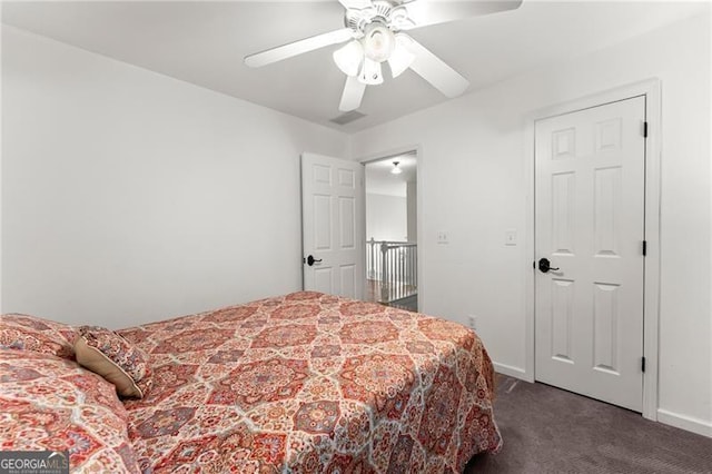 5055 Hamptons Club Dr, Alpharetta, GA 30004 - carpeted bedroom featuring a ceiling fan and baseboards