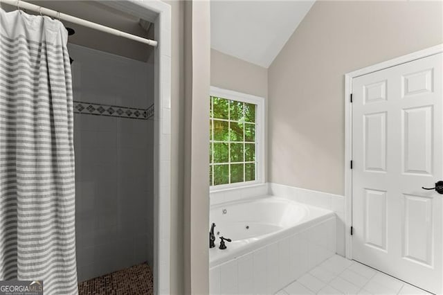 5055 Hamptons Club Dr, Alpharetta, GA 30004 - bathroom featuring vaulted ceiling, a shower stall, a tub with jets, and tile patterned flooring