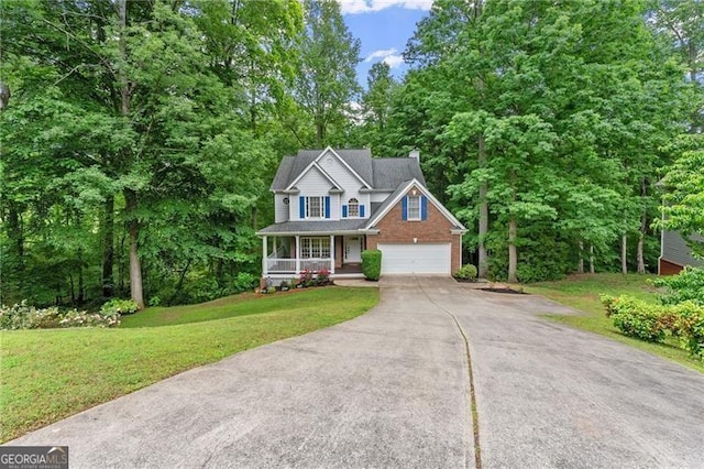5055 Hamptons Club Dr, Alpharetta, GA 30004 - traditional home with a porch, driveway, a front yard, a garage, and brick siding
