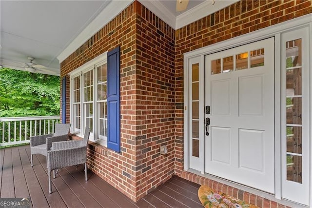 5055 Hamptons Club Dr, Alpharetta, GA 30004 - doorway to property featuring brick siding, a porch, and a ceiling fan