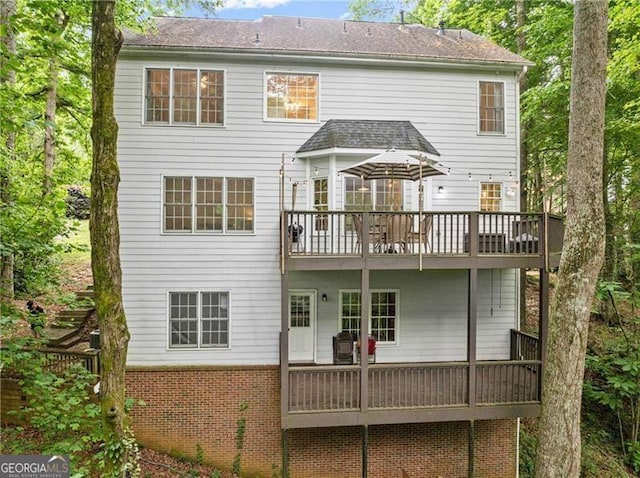 5055 Hamptons Club Dr, Alpharetta, GA 30004 - back of property with a wooden deck and brick siding