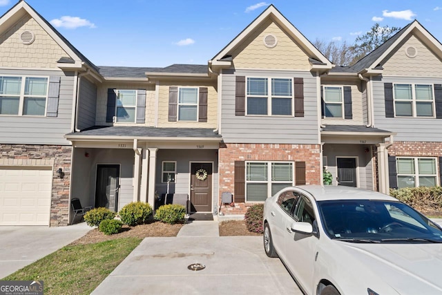 multi unit property with stone siding and brick siding