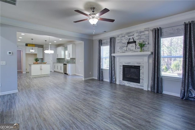 190 Crown Pointe Dr, Dawsonville, GA 30534 - unfurnished living room with ceiling fan, crown molding, baseboards, wood finished floors, and a fireplace
