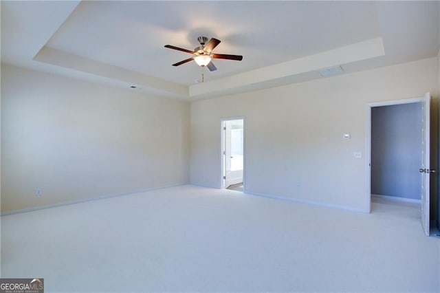 190 Crown Pointe Dr, Dawsonville, GA 30534 - carpeted empty room with a raised ceiling, a ceiling fan, and baseboards