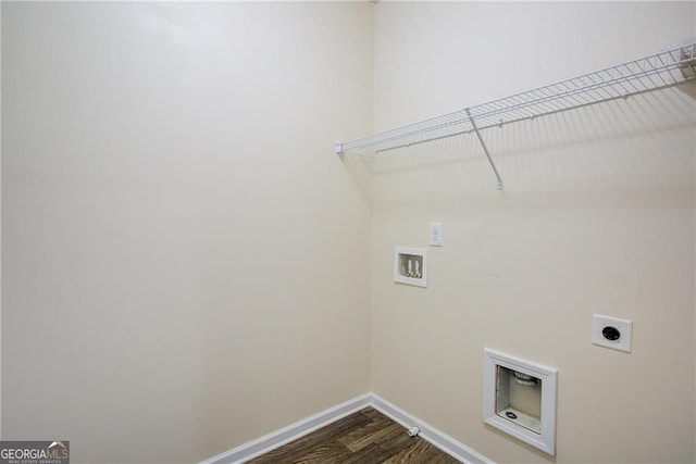 190 Crown Pointe Dr, Dawsonville, GA 30534 - washroom featuring electric dryer hookup, washer hookup, dark wood-type flooring, and baseboards