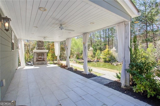 190 Crown Pointe Dr, Dawsonville, GA 30534 - view of patio with an outdoor stone fireplace and ceiling fan