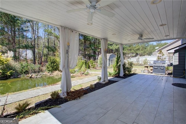 190 Crown Pointe Dr, Dawsonville, GA 30534 - view of patio with ceiling fan, a grill, and a water view
