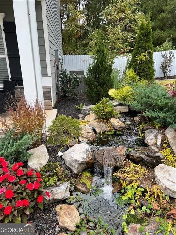 190 Crown Pointe Dr, Dawsonville, GA 30534 - view of yard featuring a small pond