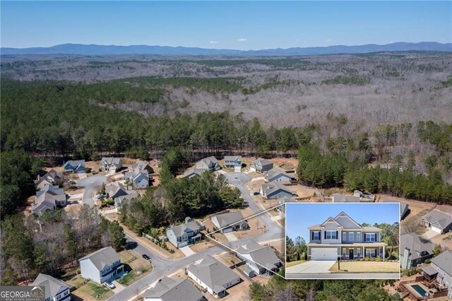 190 Crown Pointe Dr, Dawsonville, GA 30534 - aerial view of residential area featuring a heavily wooded area and mountains