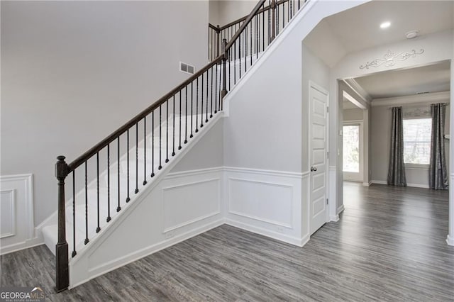 190 Crown Pointe Dr, Dawsonville, GA 30534 - stairs featuring wood finished floors, wainscoting, and a decorative wall