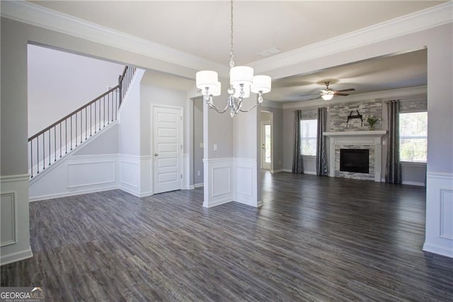 190 Crown Pointe Dr, Dawsonville, GA 30534 - unfurnished living room featuring dark wood-style flooring, a chandelier, ceiling fan, a wainscoted wall, and stairway