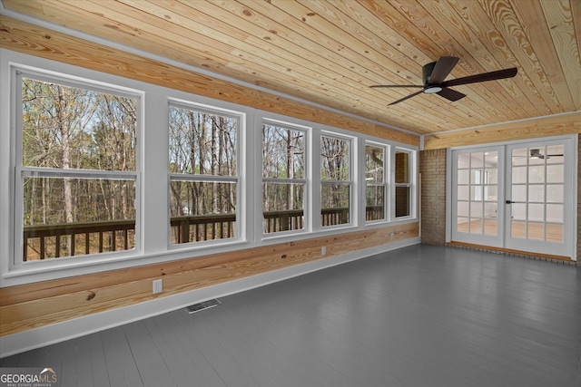 unfurnished sunroom with french doors and visible vents