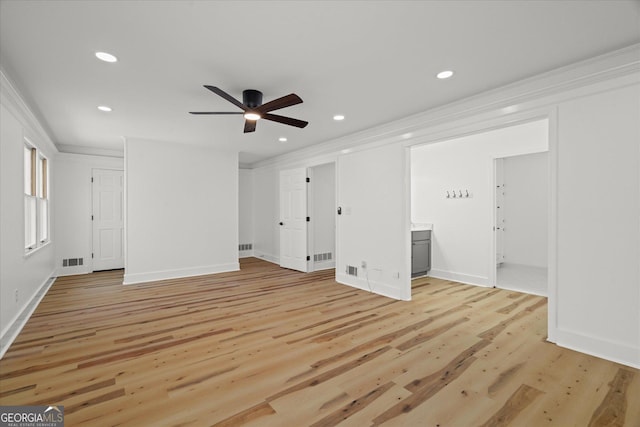 unfurnished bedroom featuring ornamental molding, light wood finished floors, visible vents, and recessed lighting