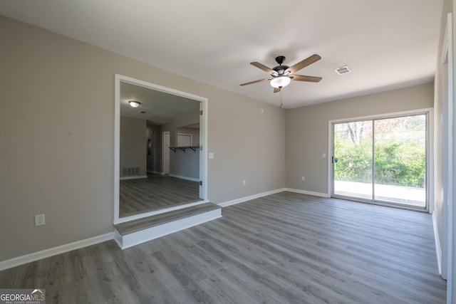 54 Jean Ct, Hiram, GA 30141 - empty room featuring baseboards, visible vents, wood finished floors, and a ceiling fan