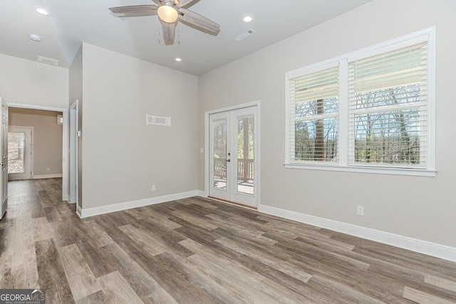 4660 Perry Rd, Gainesville, GA 30506 - empty room with french doors, wood finished floors, a ceiling fan, and recessed lighting
