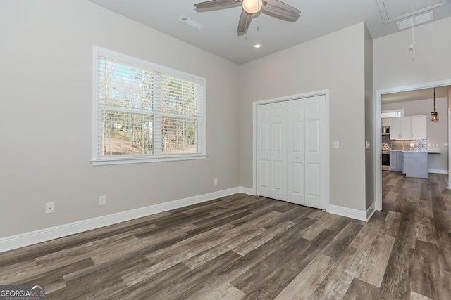 4660 Perry Rd, Gainesville, GA 30506 - unfurnished bedroom with attic access, dark wood-type flooring, a closet, a ceiling fan, and recessed lighting